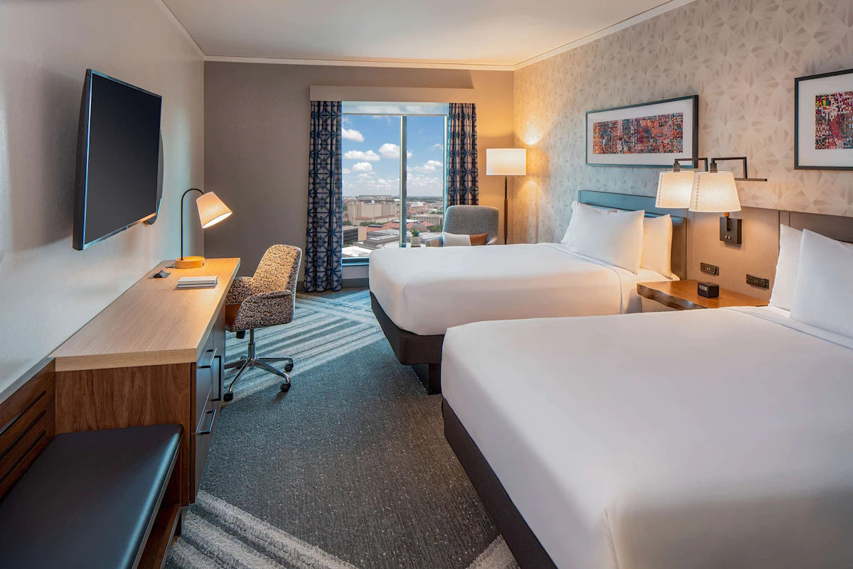 Turn 12 + Hilton Garden Inn Uni Capitol Hotel Package