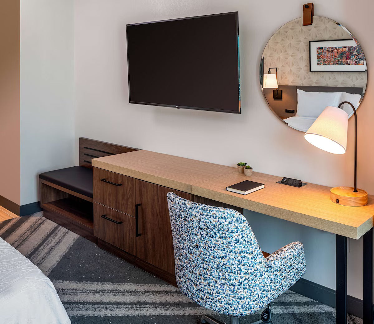 Turn 12 + Hilton Garden Inn Uni Capitol Hotel Package